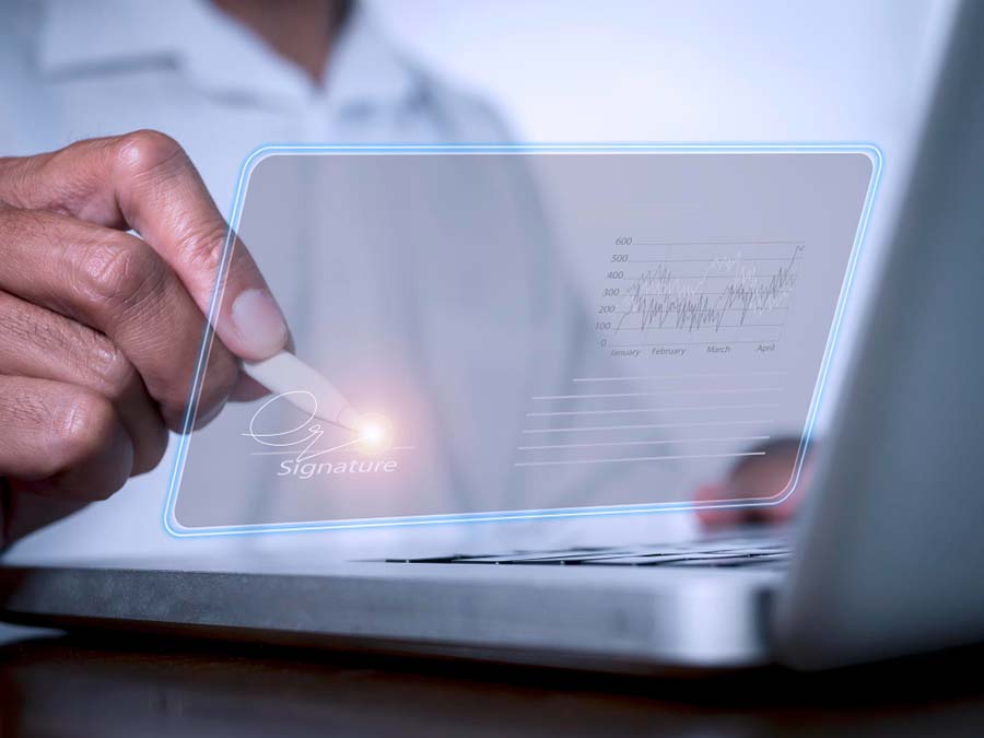 person using electronic signature to sign a virtual document